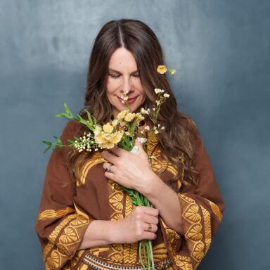 Image of Teodora Brody holding flowers
